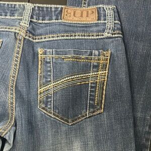 448.  Cowgirl up Boot Cut Jeans- altered length